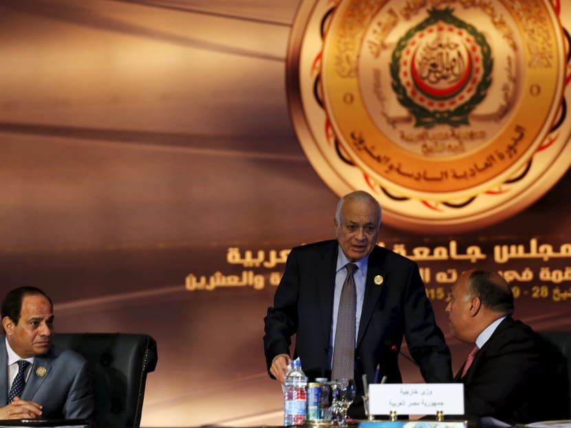 Egyptian President Abdel Fattah al-Sisi (left) looks on to Egypt's Foreign Minister Sameh Shoukry (right) and Arab League Secretary-General Nabil Elaraby (centre) before the start for the closing session of the Arab Summit in Sharm el-Sheikh. Photo: Reuters