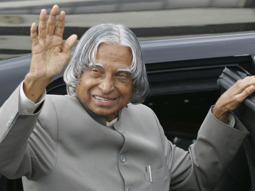 In this 2006 file photo, the then Indian President A.P.J. Abdul Kalam waves to well-wishers prior to boarding his limousine upon arrival at the Ninoy Aquino International Airport in Manila. Photo: AP
