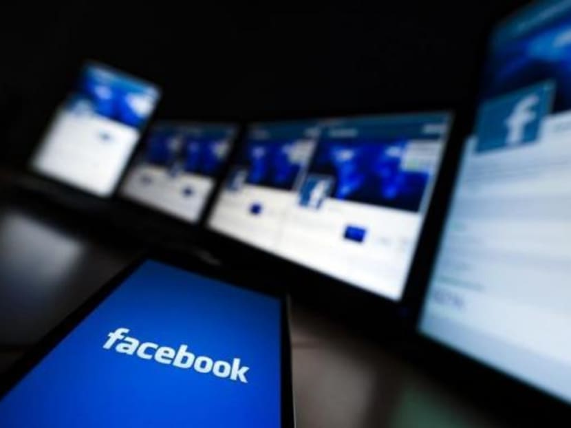 The loading screen of the Facebook application on a mobile phone is seen in this photo illustration taken in Lavigny May 16, 2012. Photo: Reuters