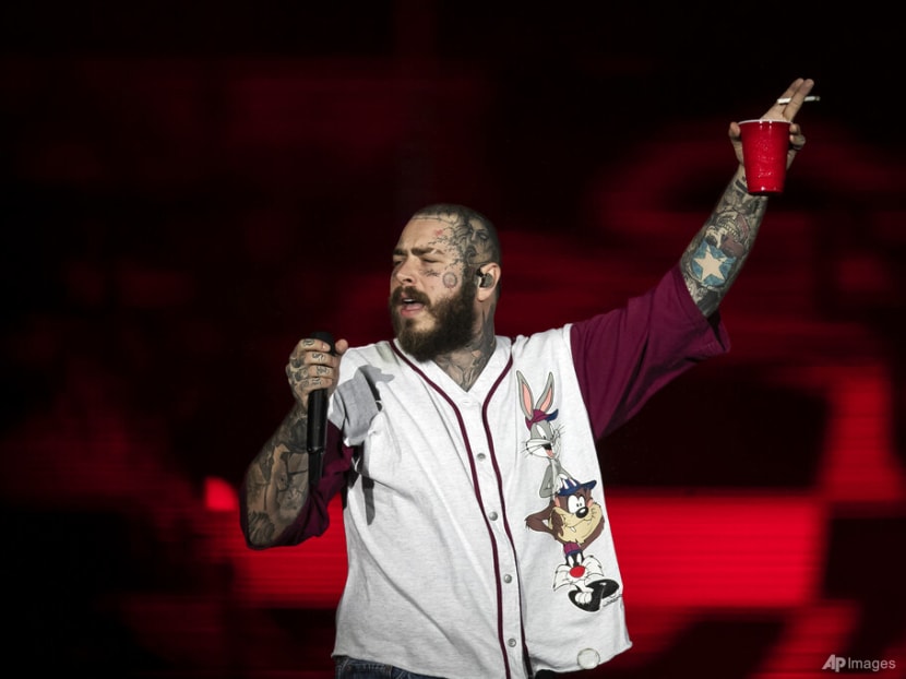 Post Malone falls into hole onstage while performing, cuts concert ...