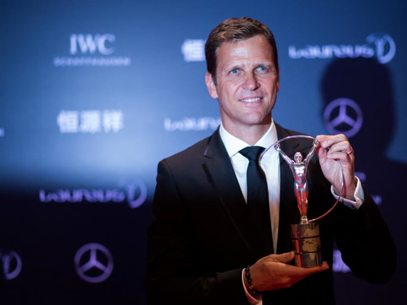 This file photo taken on April 15, 2015 shows Oliver Bierhoff, manager of the German national football team, posing with the Laureus World Sports Team of the Year Award during the Laureus World Sports Award ceremony at the Grand Theater in Shanghai.
