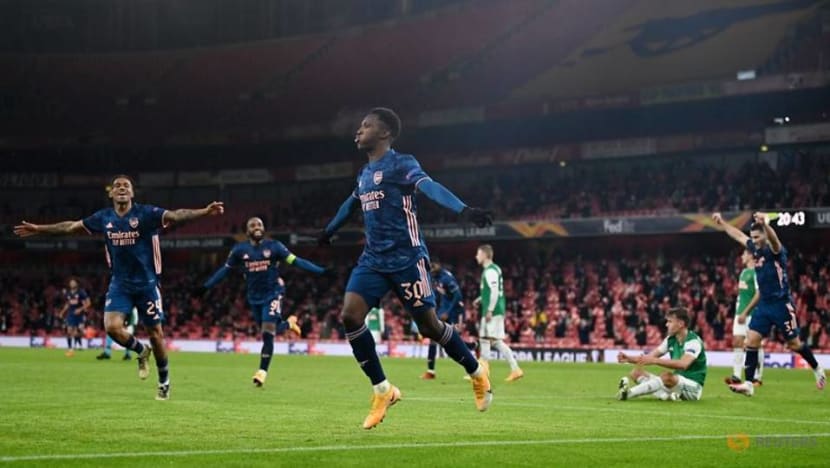Football: Night of cheer as fans return and Arsenal win big Football: Night of cheer as fans return and Arsenal win big