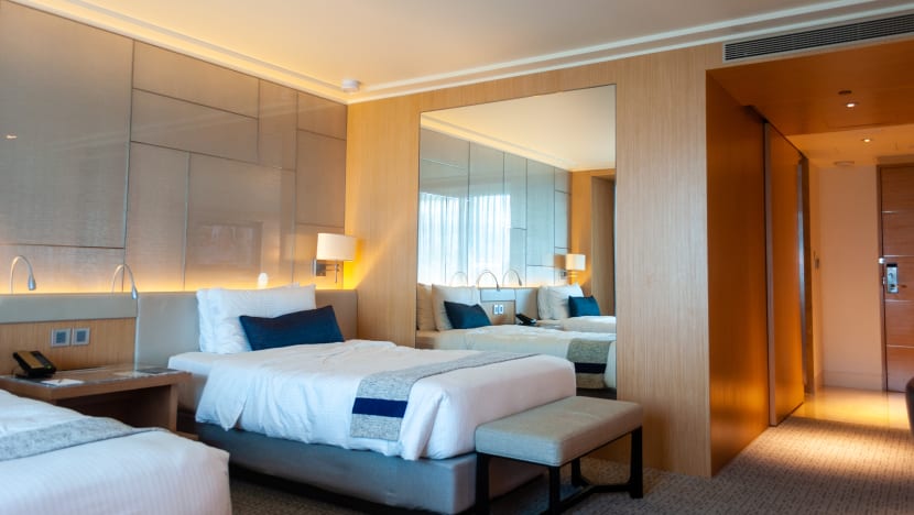 Travellers staying in Singapore hotels to recover in rooms if they test positive for COVID-19 Travellers staying in Singapore hotels to recover in rooms if they test positive for COVID-19