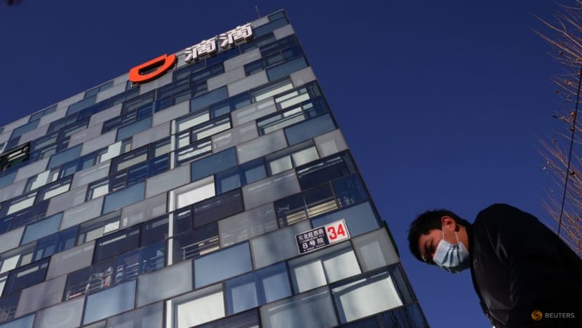 China's Didi sees 2022 revenue hit by COVID, net loss narrows 