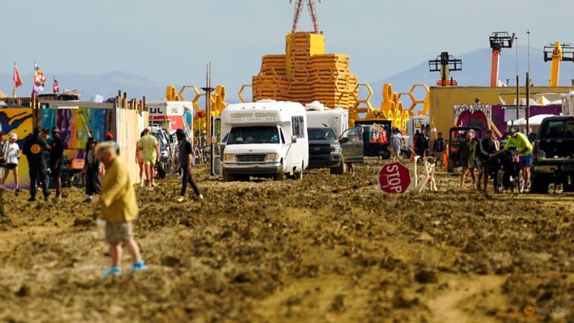 Burning Man festival exodus begins through drying mud