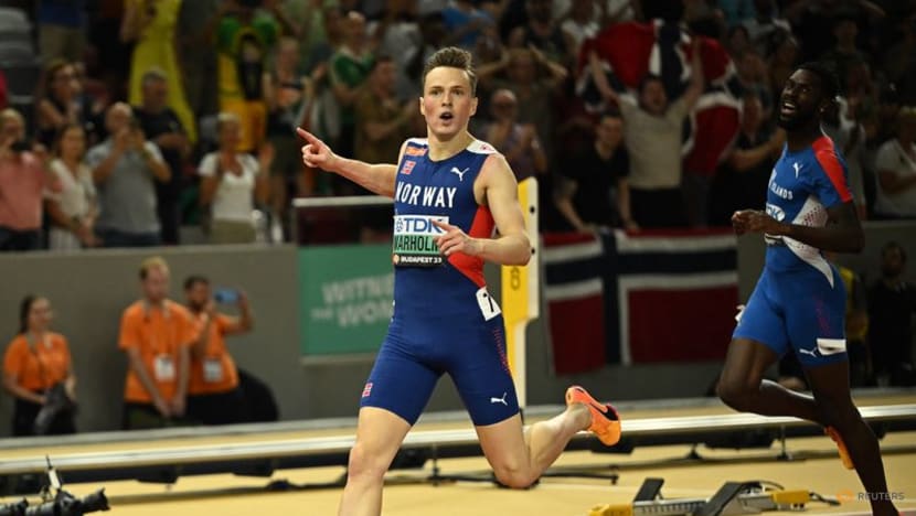 Warholm back on top of world 400-hurdles podium