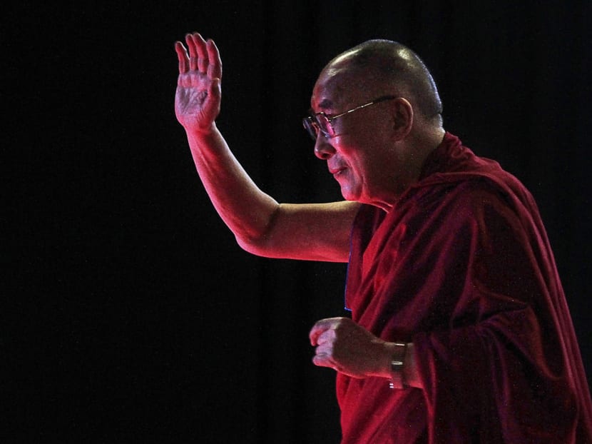 The Dalai Lama greeting an audience in Kolkata, India, earlier this month. China has warned of stiff punishments for those who support the Dalai Lama or Tibetan separatism. Photo: AP