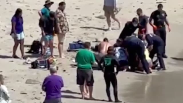 美国男子冲浪时被鲨鱼袭击 两英勇公众将他拖上岸