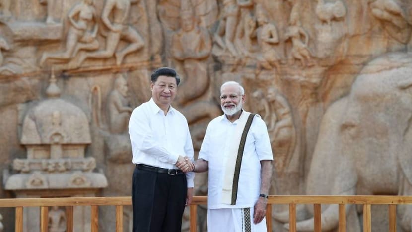 China's Xi and India's Modi discuss proposals to improve ties hit by Kashmir