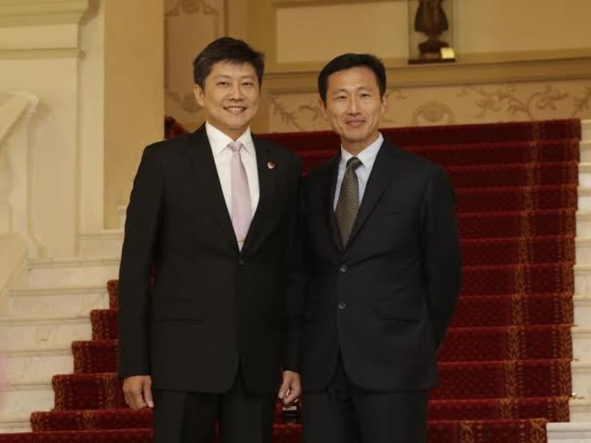 Mr Ng Chee Meng (left) and Mr Ong Ye Kung (right) during the swearing-in ceremony at the Istana on Oct 1, 2015. Photo: Wee Teck Hian