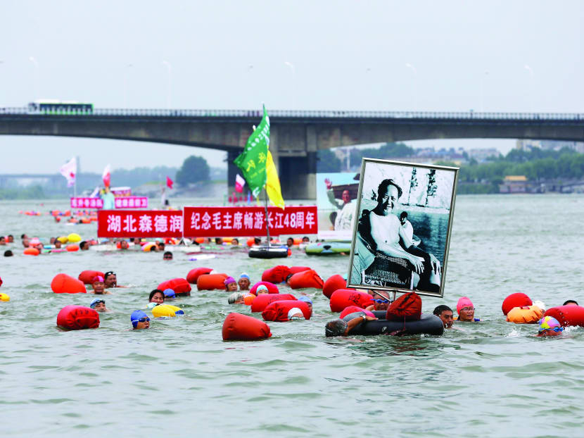 Hundreds took part in a river-swimming event earlier this month to celebrate the anniversary of Mao swimming in the Yangtze River on July 16, 1966, local media reported. PHOTO: REUTERS