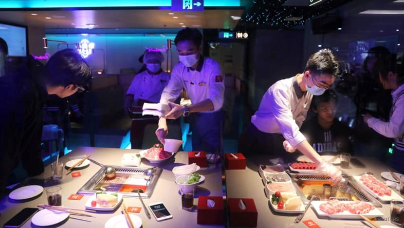 Chinese businesses guard against wave of infections feared after COVID-19 easing Chinese businesses guard against wave of infections feared after COVID-19 easing