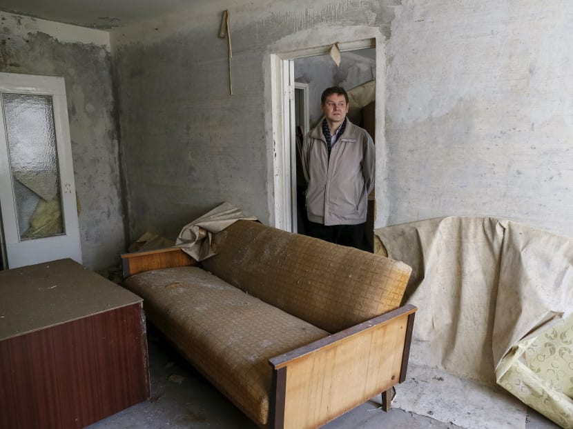 Gallery: Former Chernobyl residents take a bittersweet visit home