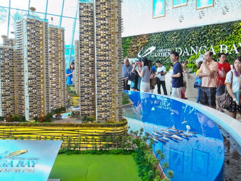 Prospective buyers at the launch of the Country Garden @ Danga Bay project. The numerous Iskandar residential projects are ready to compete for tenants from Singapore. TODAY FILE PHOTO