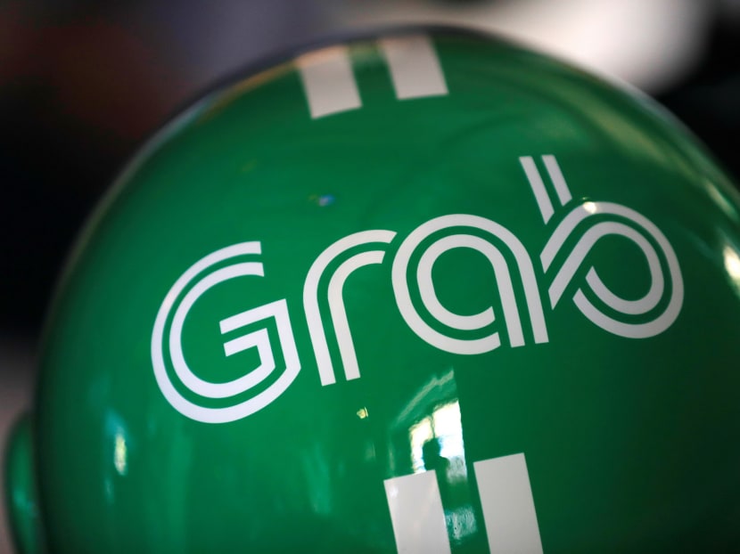 A Grab motorbike helmet is displayed during Grab's fifth anniversary news conference in Singapore on June 6, 2017.