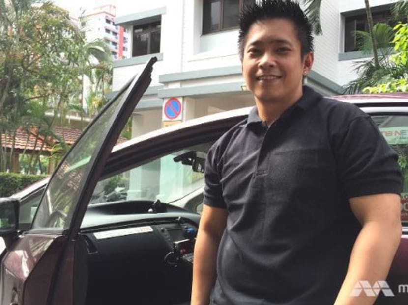 Mr Alan Dai, a 34-year-old taxi driver. Photo: Kenneth Lim/Channel NewsAsia