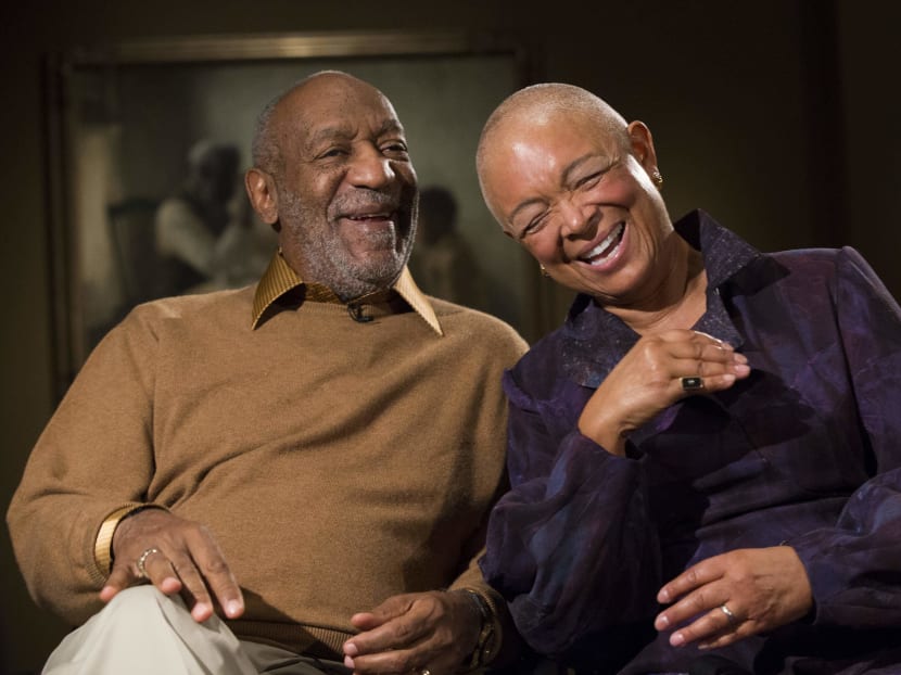 In this Nov. 6, 2014 file photo, entertainer Bill Cosby and his wife Camille laugh as they tell a story. Photo: AP