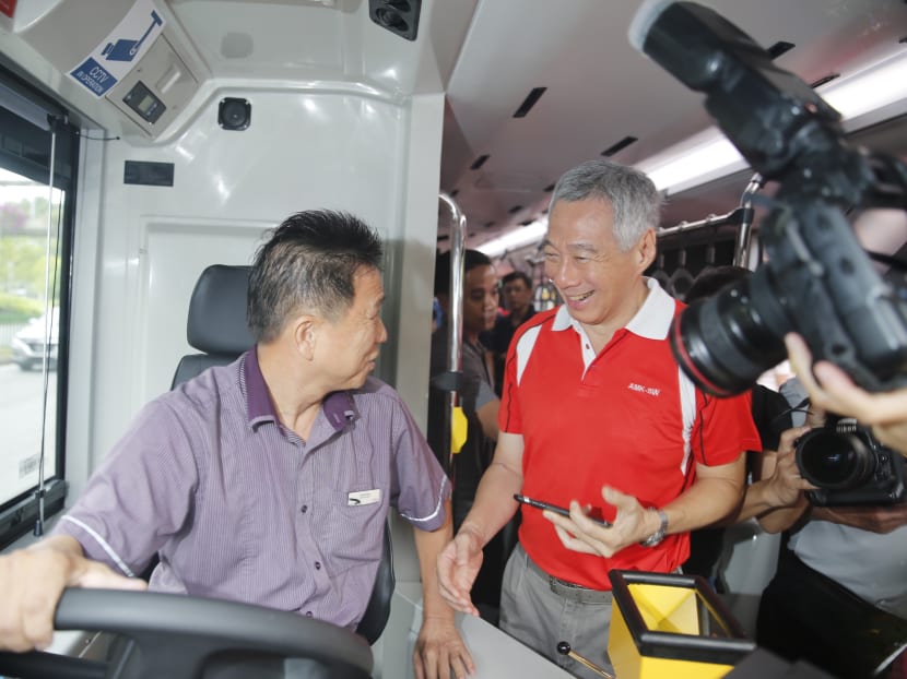 To mark the BSEP’s completion, Prime Minister Lee Hsien Loong rode the new bus service 71 – a trunk route passing through Ang Mo Kio and Bishan – on Saturday (Dec 9) morning. Photo: Najeer Yusof/TODAY