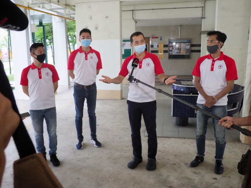 (From left) Mr Williiamson Lee, Mr Melvyn Chiu, Mr Steve Chia and Mr Osman Sulaiman speaking to the media at the void deck of Block 131 Bishan Street 12 on June 20, 2020.