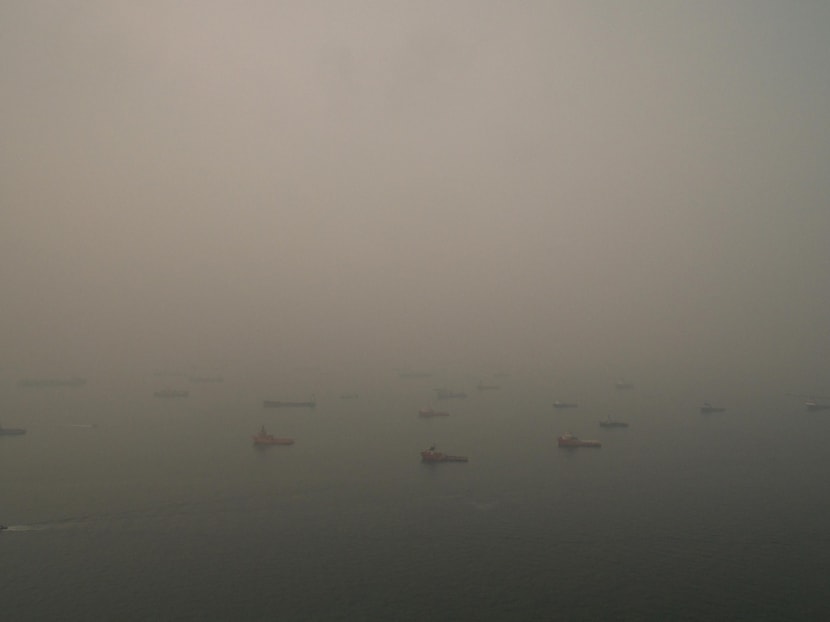 A haze-shrouded view of ships off Marina Bay at about 10am on September 13, 2015. Photo: Mugilan Rajasegeran/TODAY