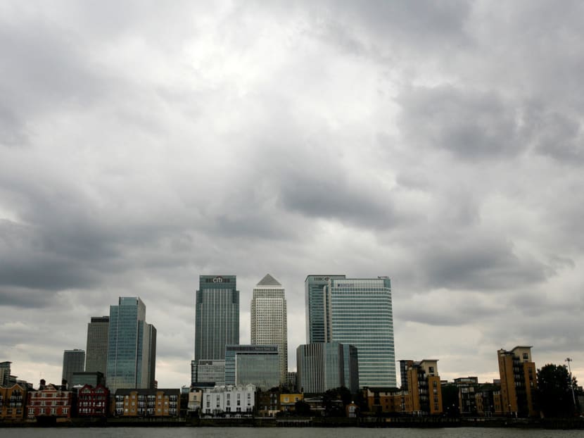 Storm clouds gathering above London’s Canary Wharf financial district. Many financial centres did not heed warnings ahead of the worst global economic crisis since the Great Depression. Photo: REUTERS
