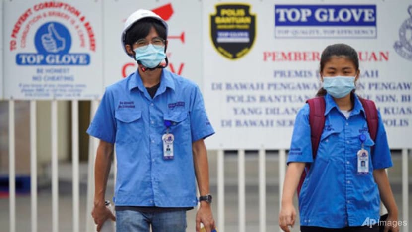 Covid 19 Malaysian Government Opens Investigations Into Top Glove Over Workers Housing Cna