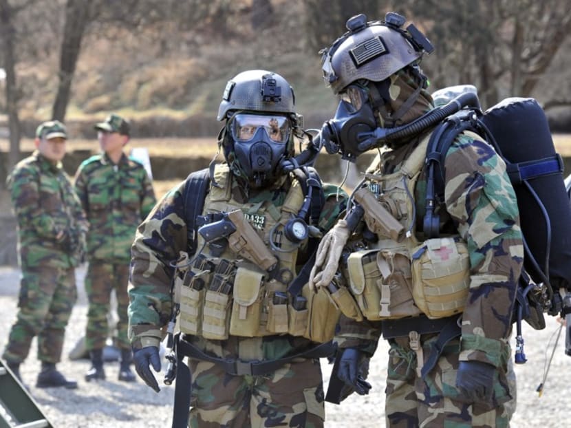 Troops in chemical warfare garb during a joint United States-South Korean military drill. Photo: AFP