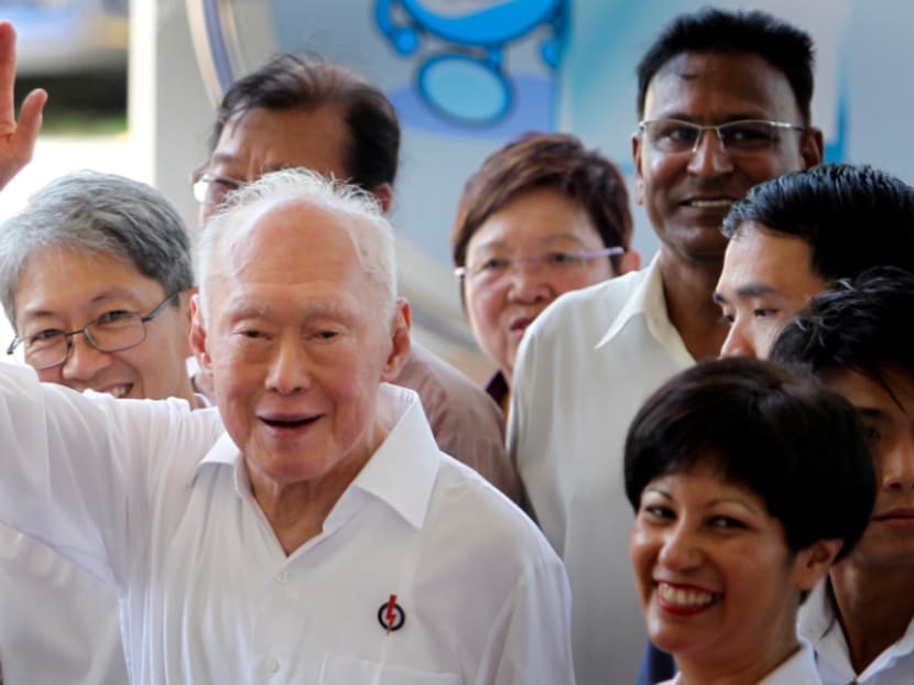 In this April 27, 2011, file photo, Singapore's then Minister Mentor Lee Kuan Yew waves to supporters as he arrives at an elections nomination center in Singapore. Photo: AP