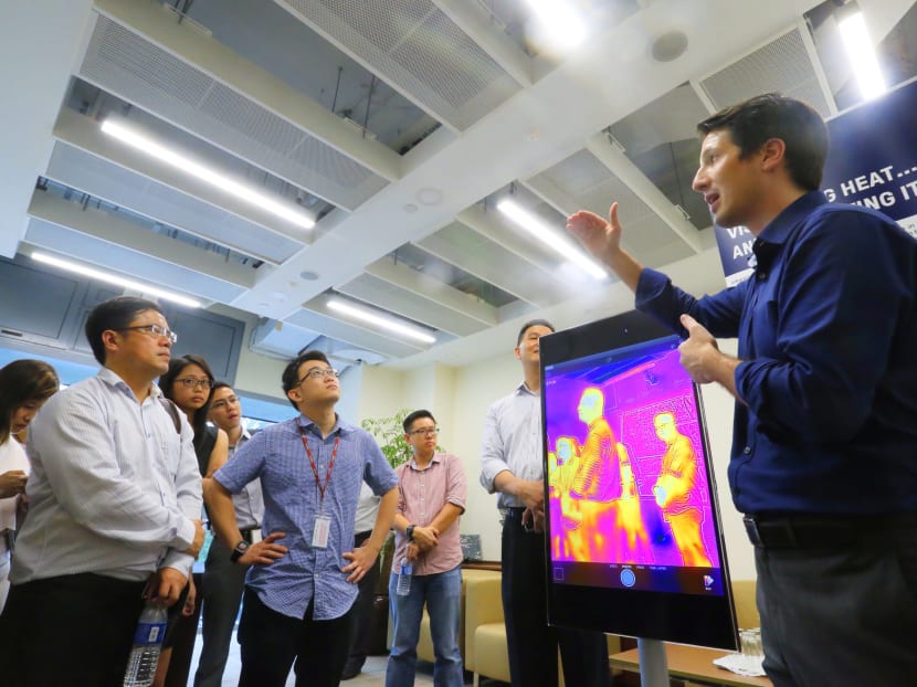 A tour conducted by 3for2@UWCSEA, the pilot implementation of the ‘3for2’ energy-efficient air-conditioning technology concept at the United World College of South East Asia (UWCSEA) today (Jan 19). Photo: Ernest Chua