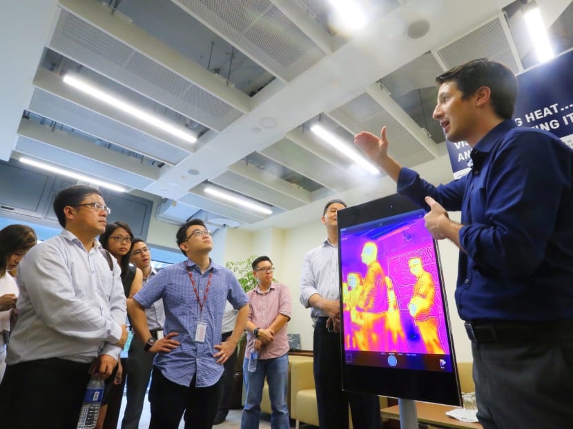 A tour conducted by 3for2@UWCSEA, the pilot implementation of the ‘3for2’ energy-efficient air-conditioning technology concept at the United World College of South East Asia (UWCSEA) today (Jan 19). Photo: Ernest Chua A tour conducted by 3for2@UWCSEA, the pilot implementation of the ‘3for2’ energy-efficient air-conditioning technology concept at the United World College of South East Asia (UWCSEA) today (Jan 19). Photo: Ernest Chua
