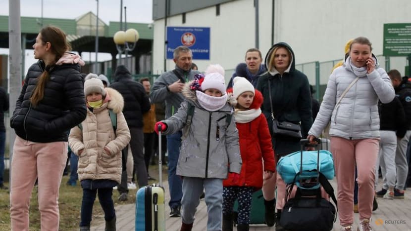 Refugees flee across EU borders as Ukrainian fighting intensifies Refugees flee across EU borders as Ukrainian fighting intensifies