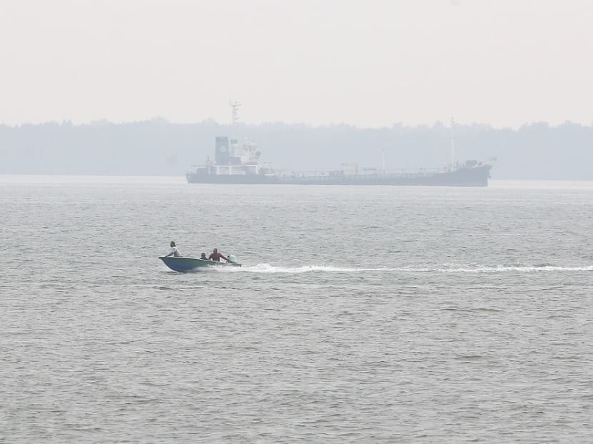 A ship is seen on a hazy day at Northport, Klang,Sept 9, 2019.