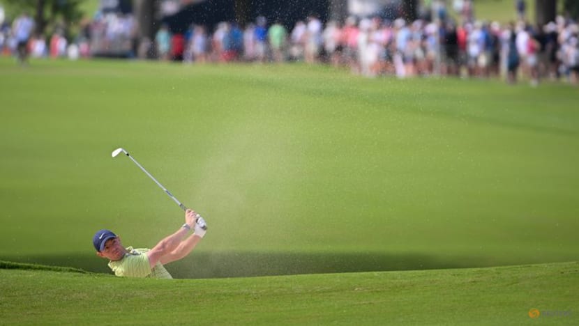 McIlroy grabs PGA Championship lead as Woods falters McIlroy grabs PGA Championship lead as Woods falters