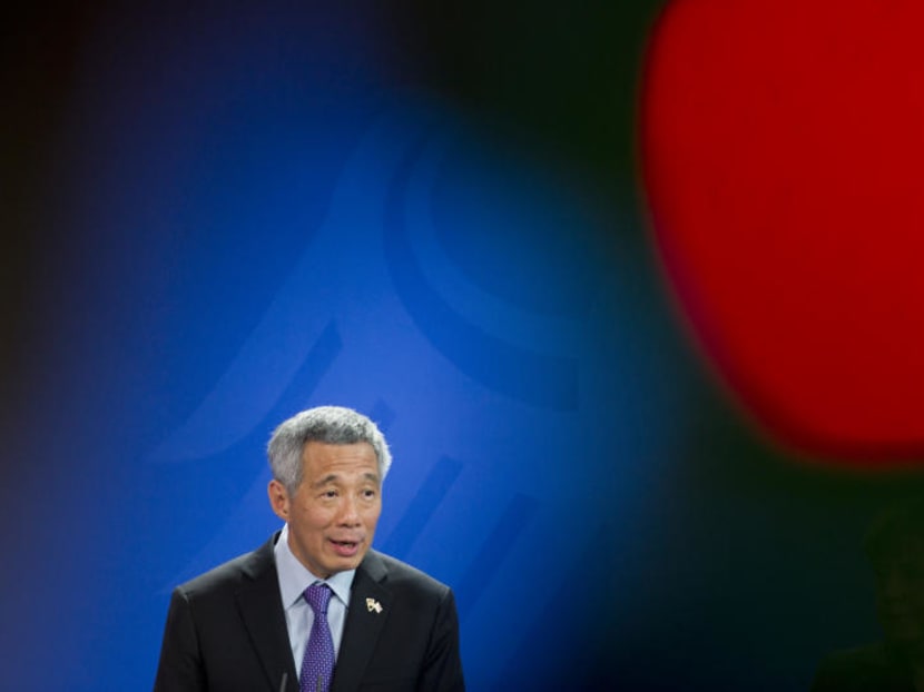 Prime Minister Lee Hsien Loong addresses the media during a joint press conference as part of a meeting with German Chancellor Angela Merkel at the chancellery in Berlin, Germany, on Feb 3 this year. Photo: AP