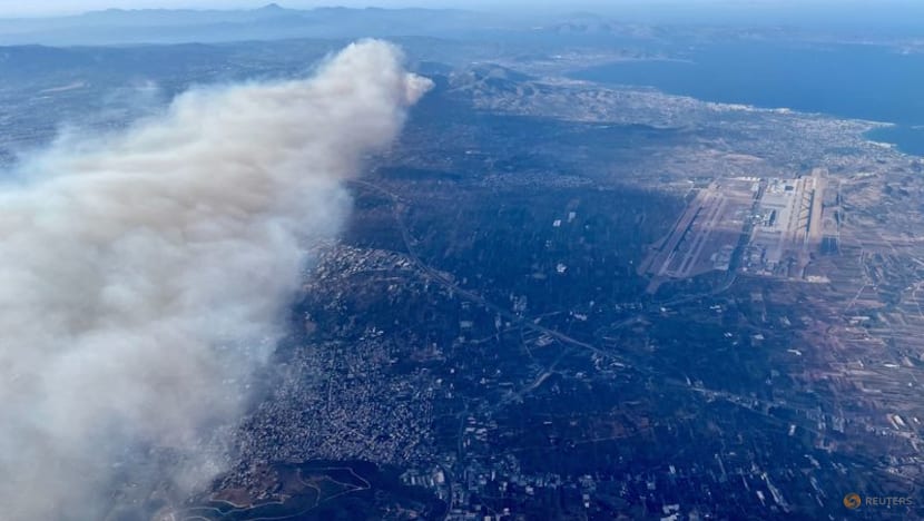 Greek wildfire rages near Athens; homes, hospital evacuated Greek wildfire rages near Athens; homes, hospital evacuated