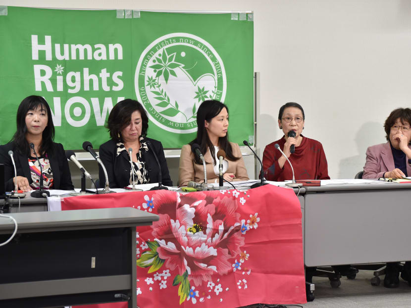 Japanese activists and lawyers, from left to right, lawyer and the head of Human Rights Now Kazuko Ito, lawyer Hiroko Goto, activist Shihoko Fujiwara, activist Setsuko Miyamoto, and lawyer Yukiko Tsunoda, hold a press conference in Tokyo on March 3, 2016. Photo: AFP