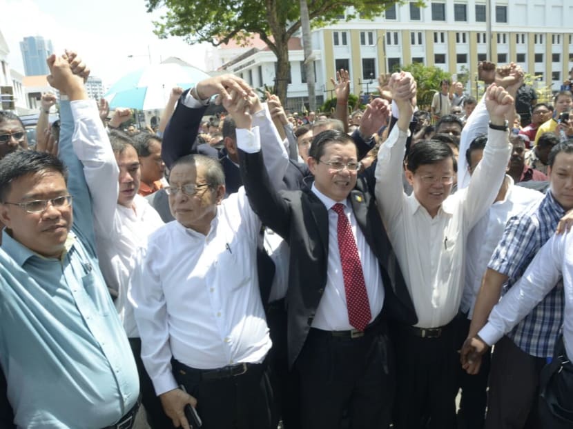 Penang Chief Minister Lim Guan Eng, centre, said on June 30, 2016, "BN can victimize me but will not crush my spirit."  Photo: Lim Guan Eng's Facebook