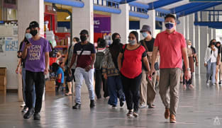 Commentary: Low risk of getting COVID-19 from indoor places – even with masks off