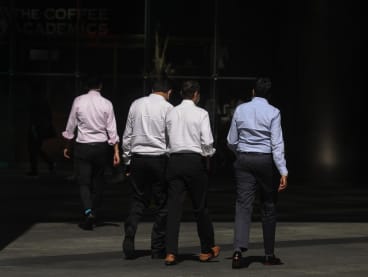 File photo of office workers in Singapore's Central Business District.
