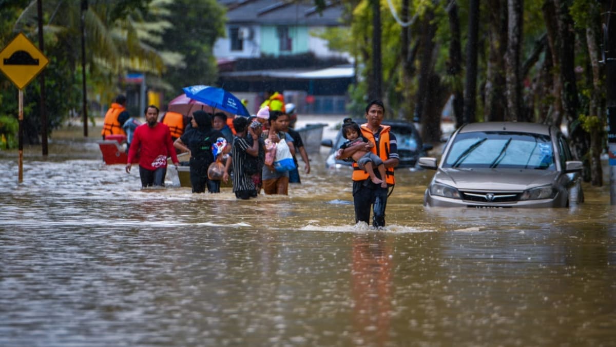 Malaysia floods: More than 27,000 evacuated as rain expected to continue -  CNA