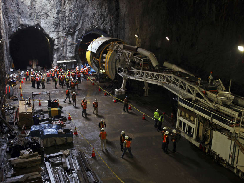 The tunnel boring machine for the first phase of the Second Avenue Subway is launched in New York. As many as 25 workers are required to run the machines in New York, while the number is roughly a dozen in other cities. Photo: The New York Times