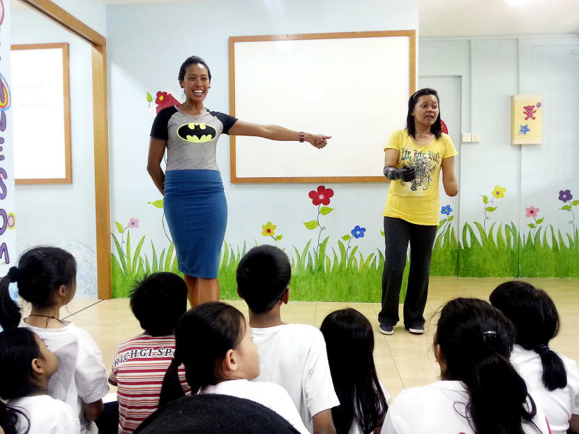 National rower Saiyidah Aisyah (left) and shooter Aishah Samad inspired their audience at the Singapore Muslim Women’s Association  Student Care Centre yesterday. Photo: PPIS