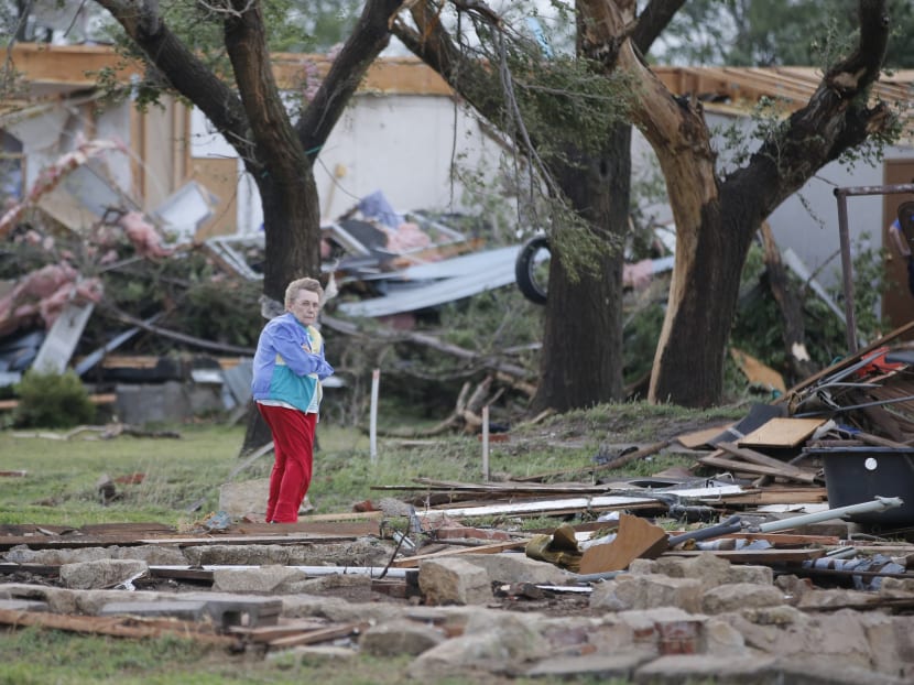 Tornadoes in southern Plains, destroy homes, flip cars