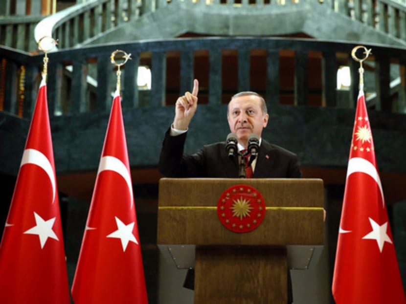Turkey’s President Recep Tayyip Erdogan once held up Turkey as a model of Muslim democracy, but he now frequently attacks democratic institutions. Photo: Reuters