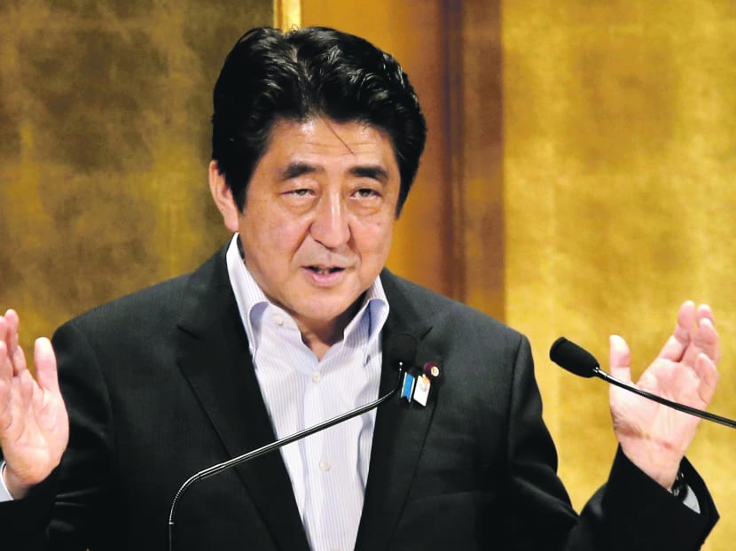 The initiatives outlined by Mr Abe yesterday included setting up special economic zones to attract foreign businesses. Photo: Reuters