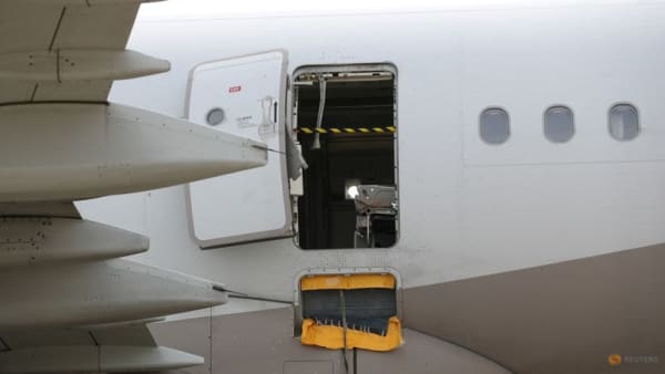Arrest warrant issued for man who opened Asiana plane door mid-air, airline bans some emergency seats