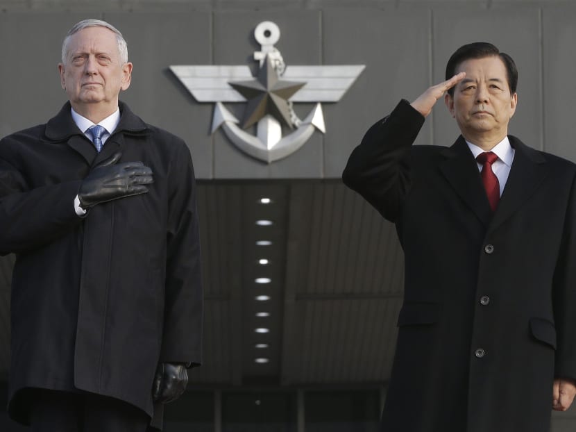 US Defence Secretary Jim Mattis, and South Korean Defence Minister Han Min Koo salute during a welcome ceremony at the Defense Ministry in Seoul, South Korea, Friday, Feb. 3, 2017. Photo: AP