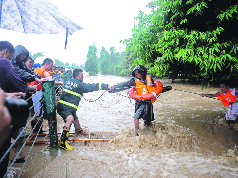 Huge landslide in western China buries dozens