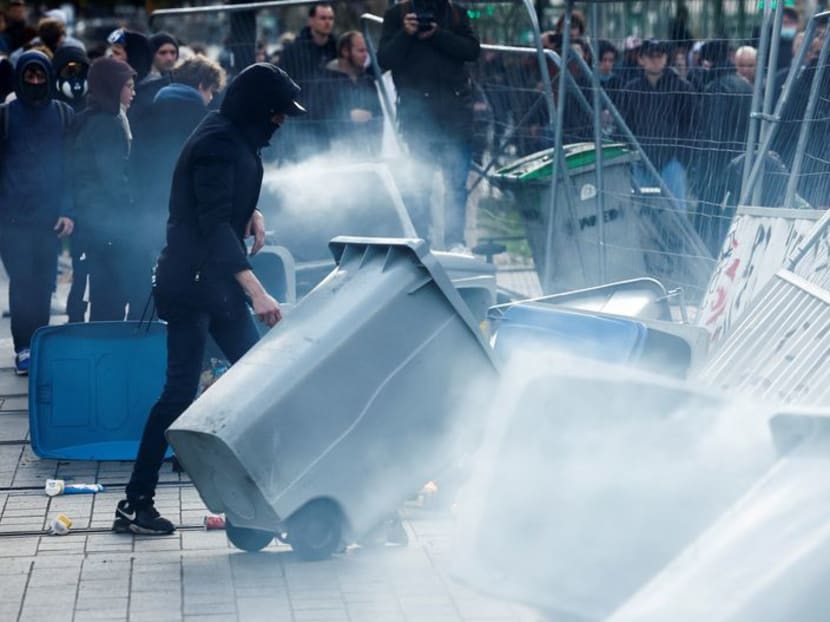 Paris police, protesters clash for third night over Macron's pension reform Paris police, protesters clash for third night over Macron's pension reform