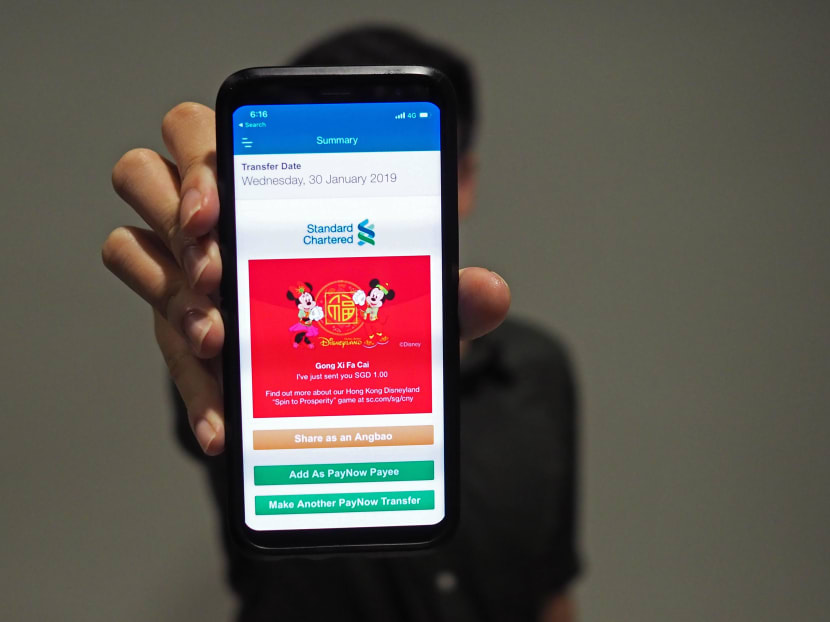 Standard Chartered Bank has partnered with Hong Kong Disneyland for its new e-hongbaos this year and customers using its mobile app can send hongbao money along with new year greetings featuring Mickey and Minnie Mouse.
